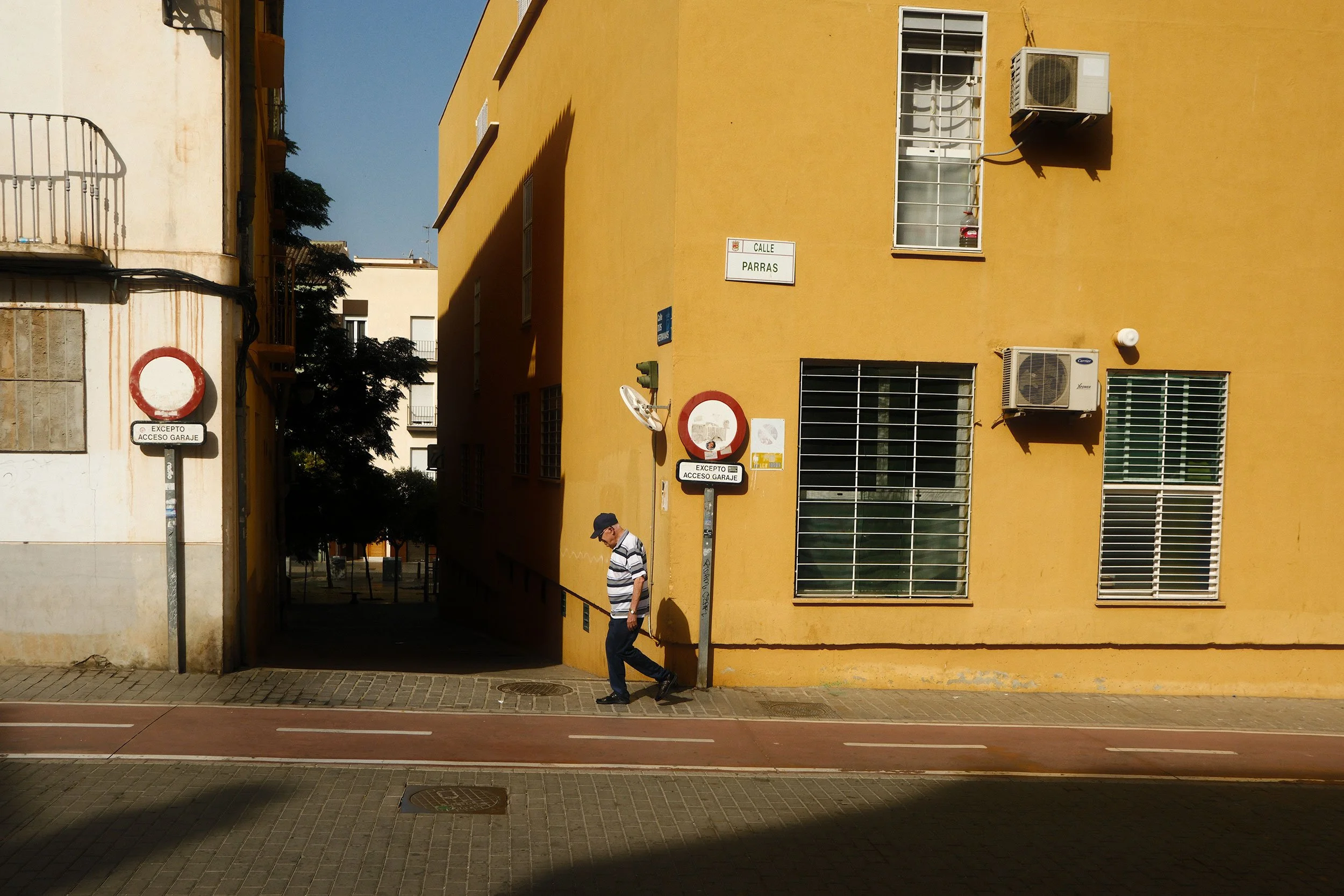Man walking on street in Malaga, Spain.