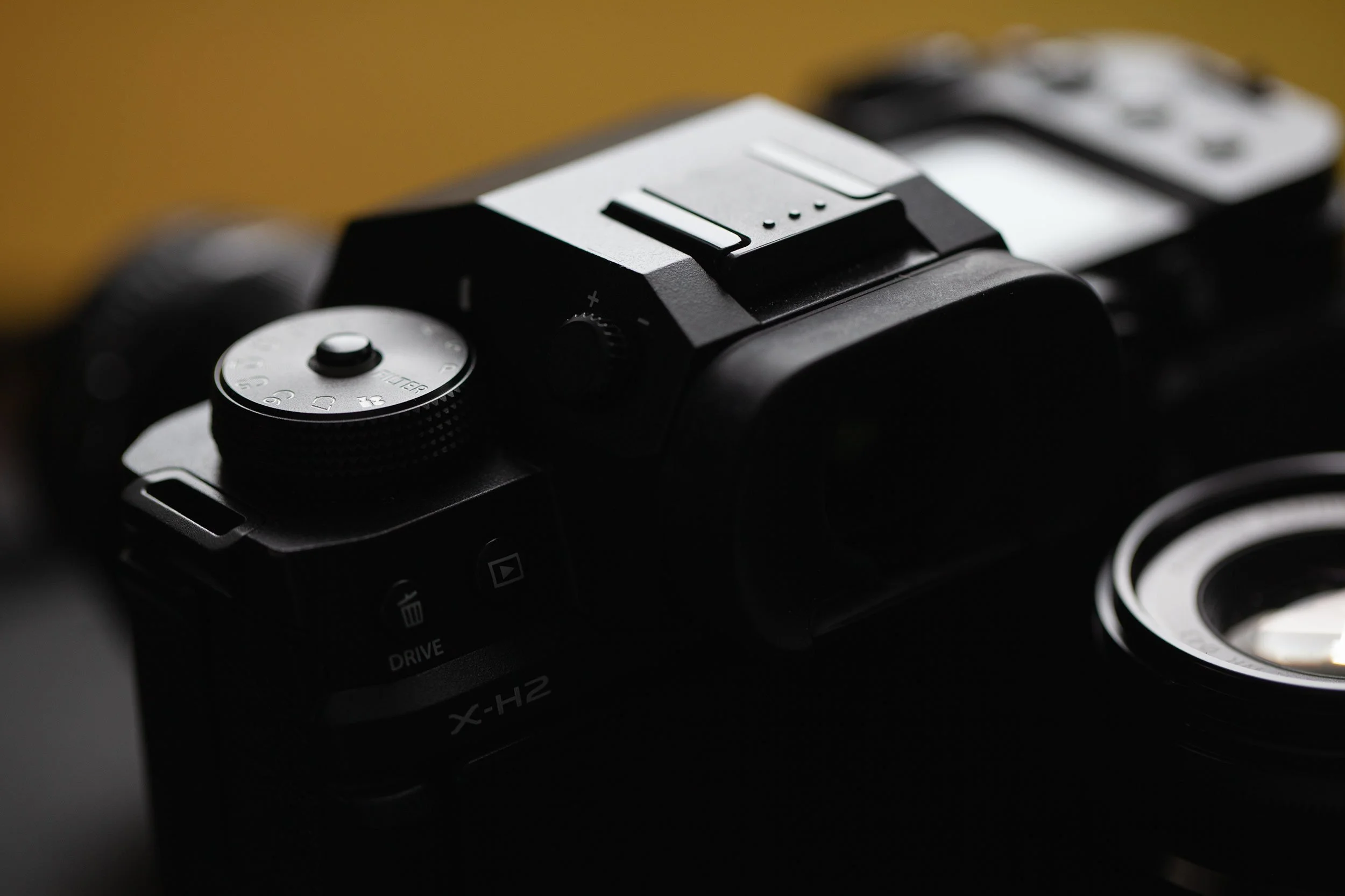 Fujifilm X-H2S mirrorless camera body dial.