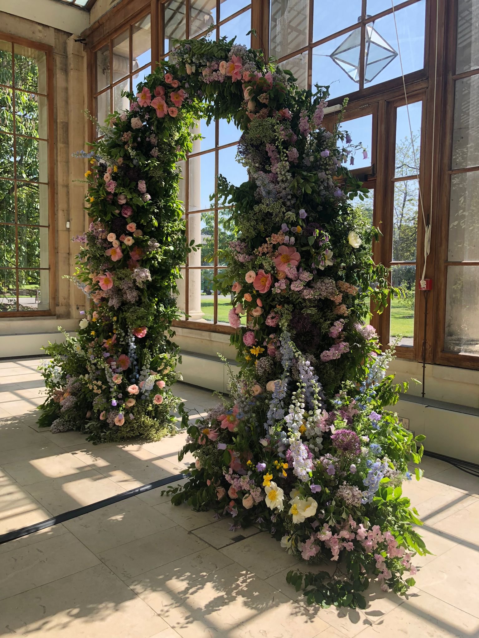 Spring wedding arch nash conservatory.jpg