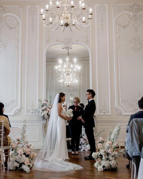 Intimate wedding ceremony white and pink flowers.jpeg