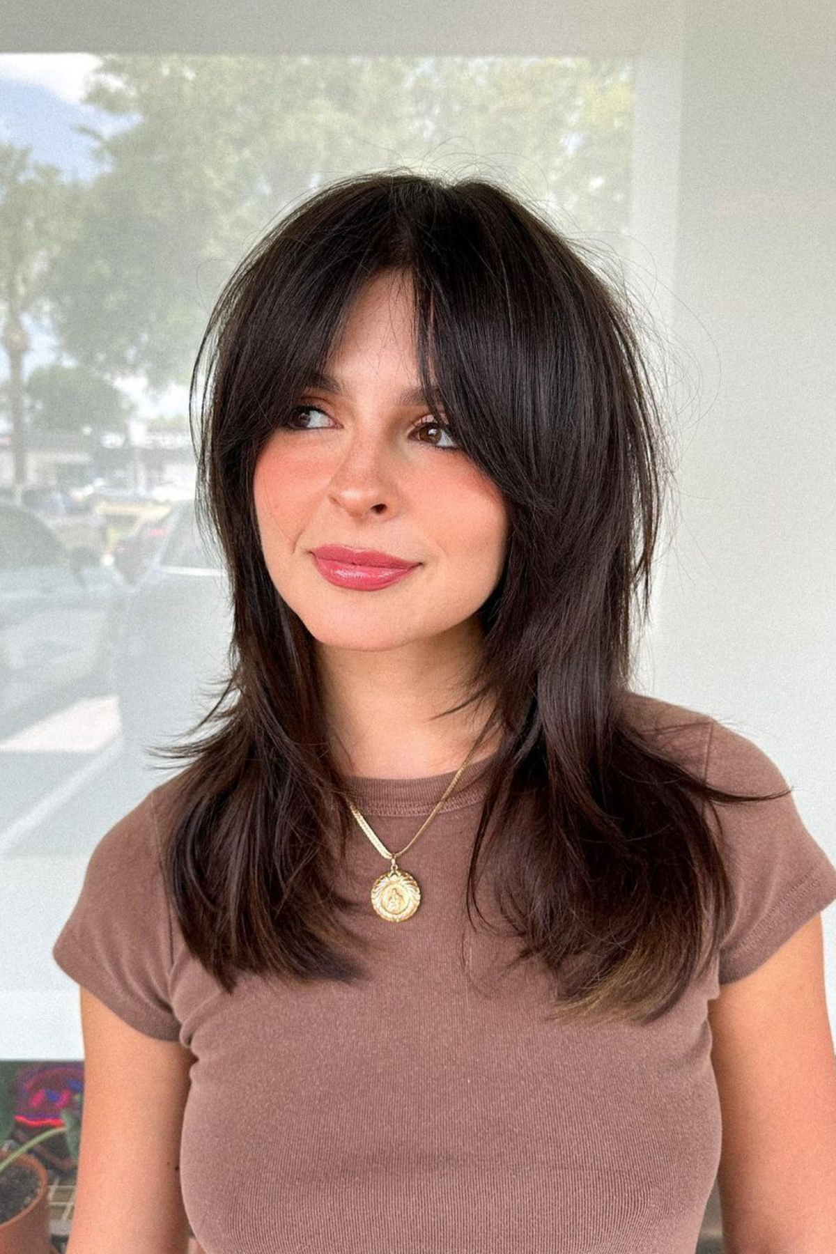 modern shag on thick wavy hair, piecey lived-in texture