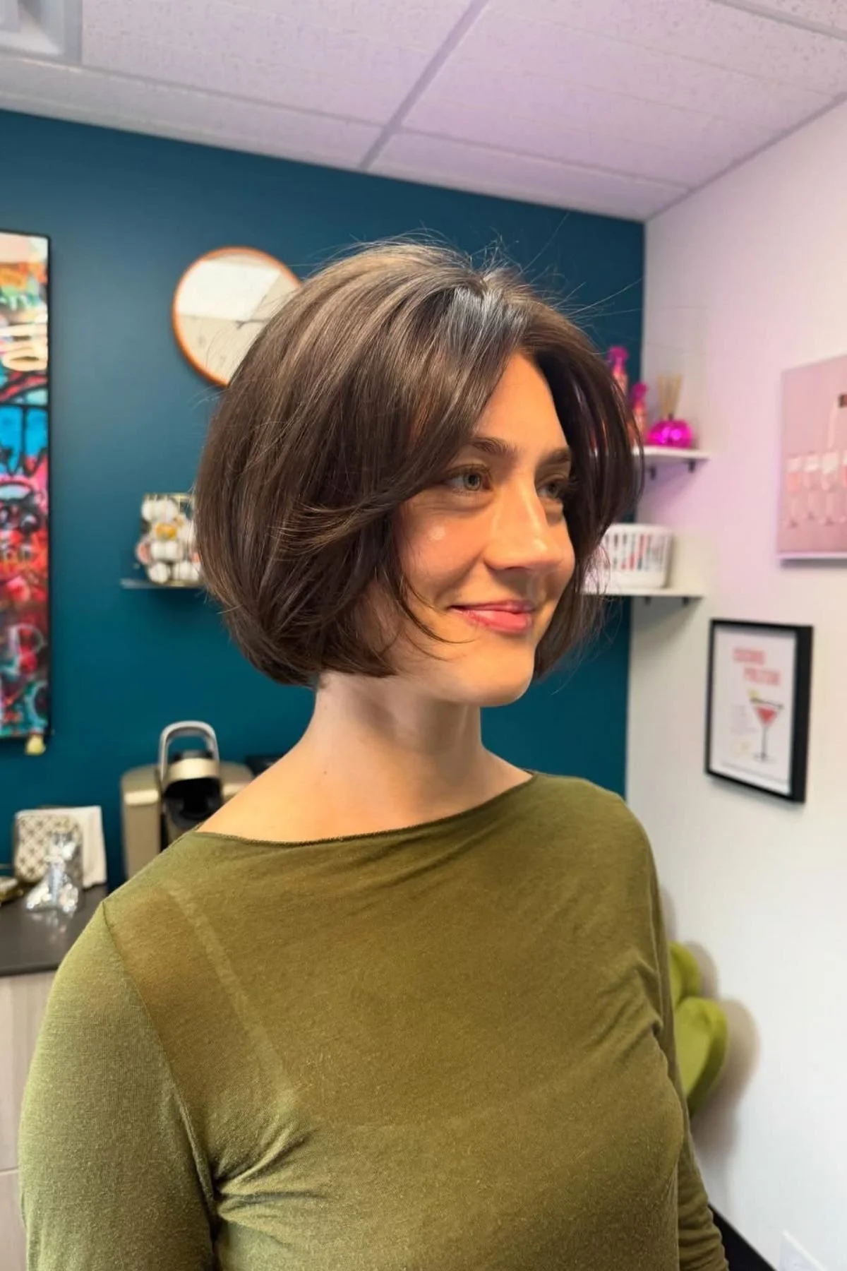 Girl wearing a Rounded Bob for Fullness haircut with softly curved shaping designed to create thicker-looking hair.