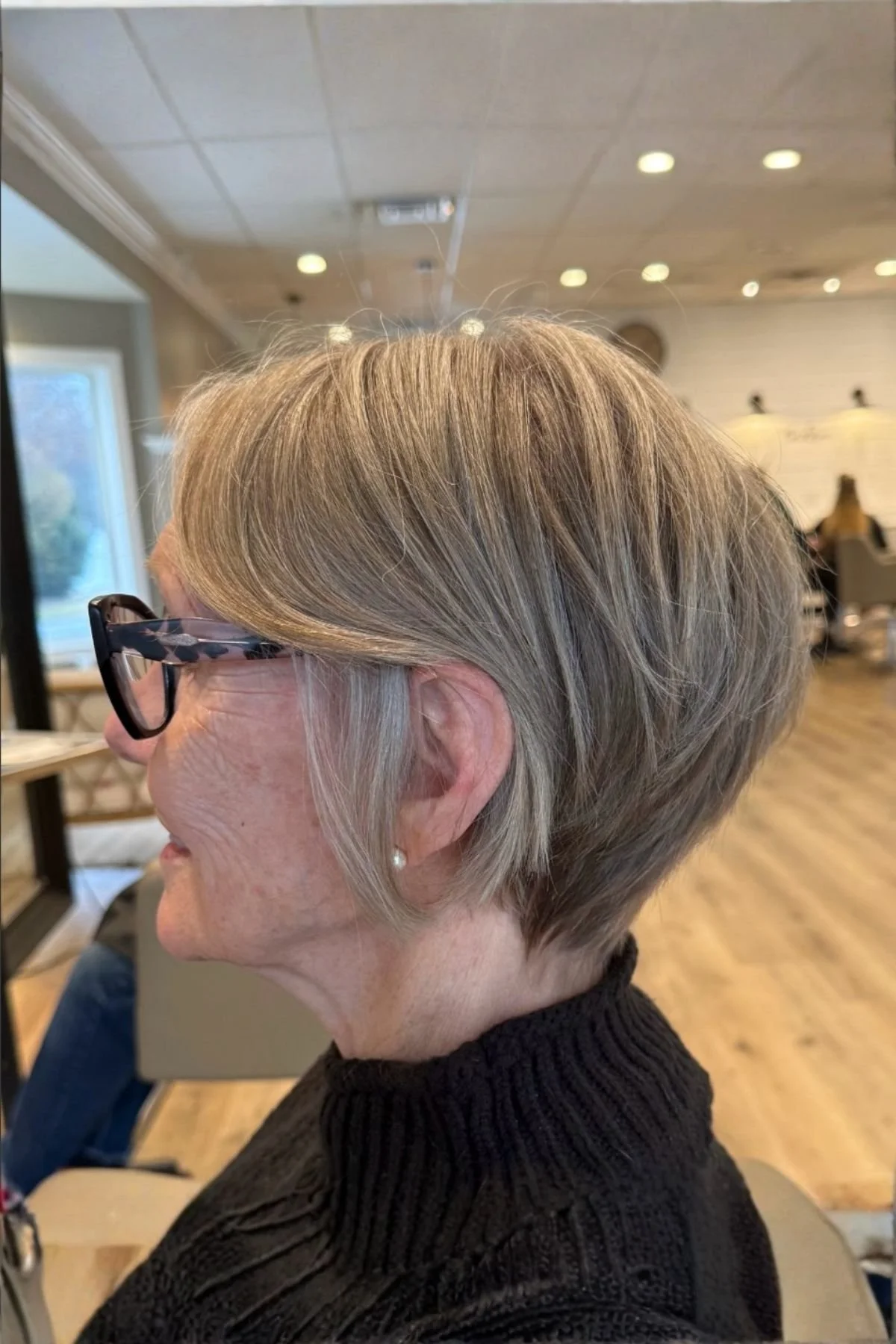 Woman wearing a Bixie Haircut for Women Over 60, featuring a soft, low-maintenance cut with gentle volume and shape.
