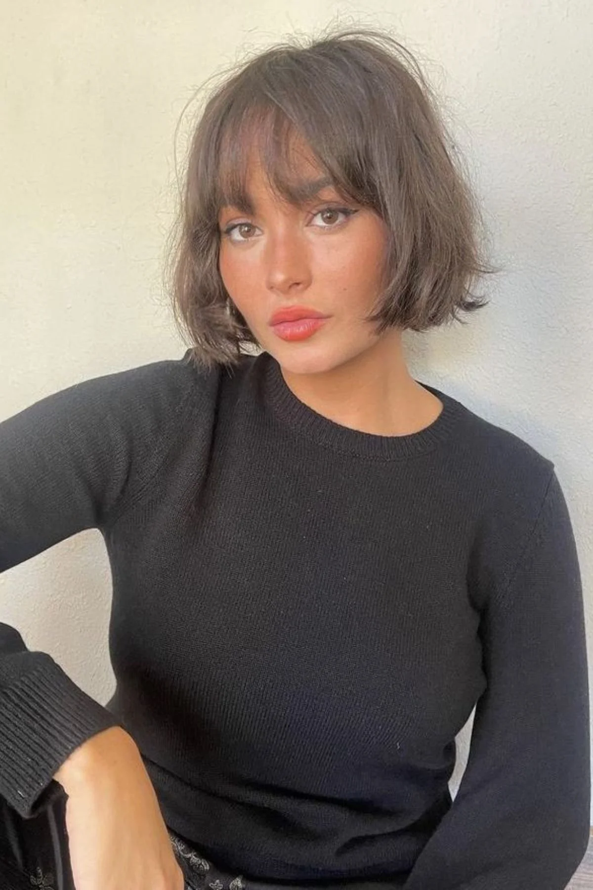 Woman wearing Soft French Bob with Bangs