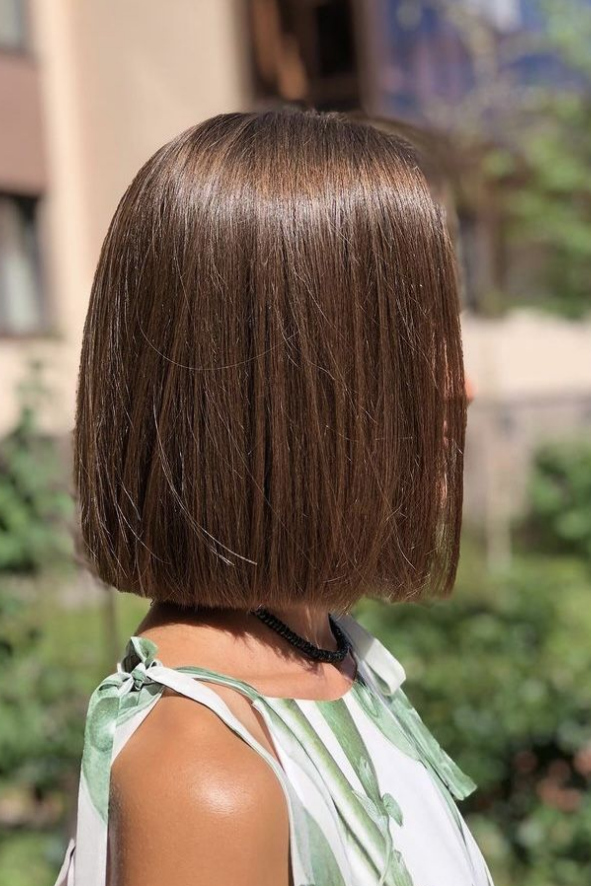 Blunt chin-length bob on fine hair with a sharp one-length perimeter