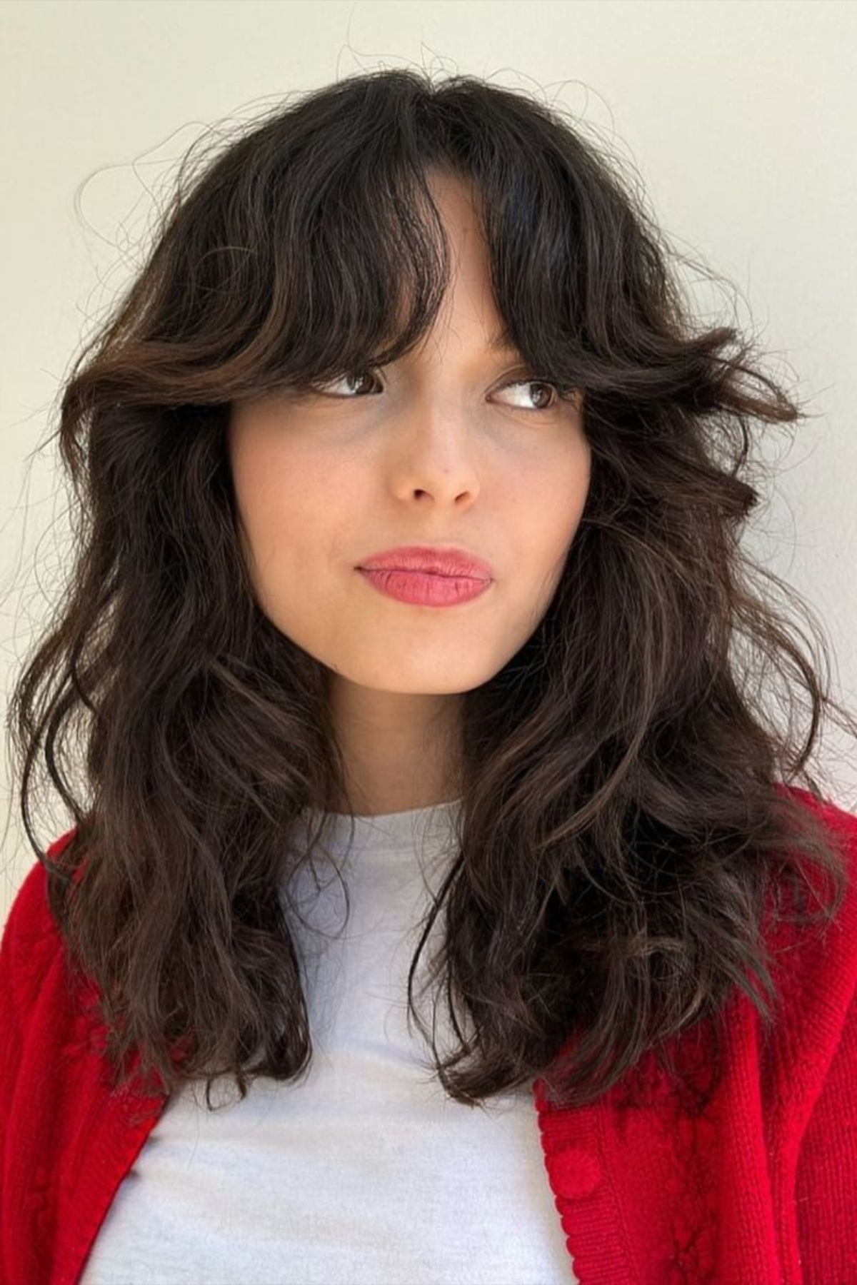 Girl wearing Curtain Bangs
