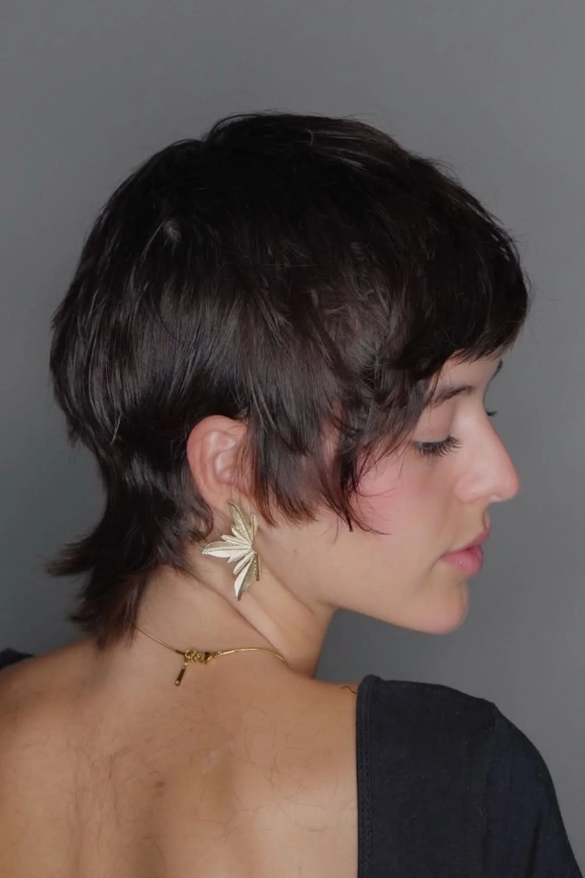 Woman wearing Modern Mullet (Short in Back, Soft in Front)
