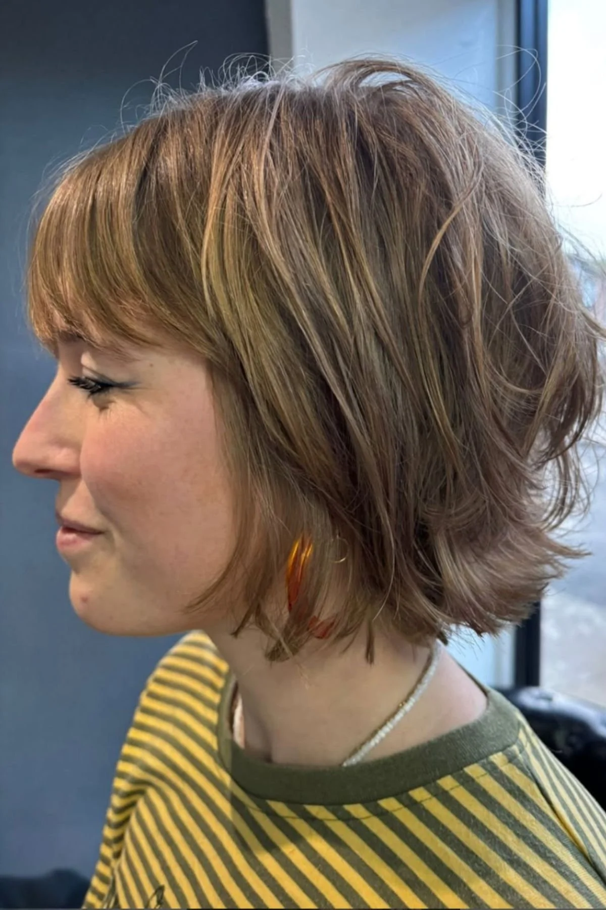 Woman wearing Choppy Bob with Curtain Bangs