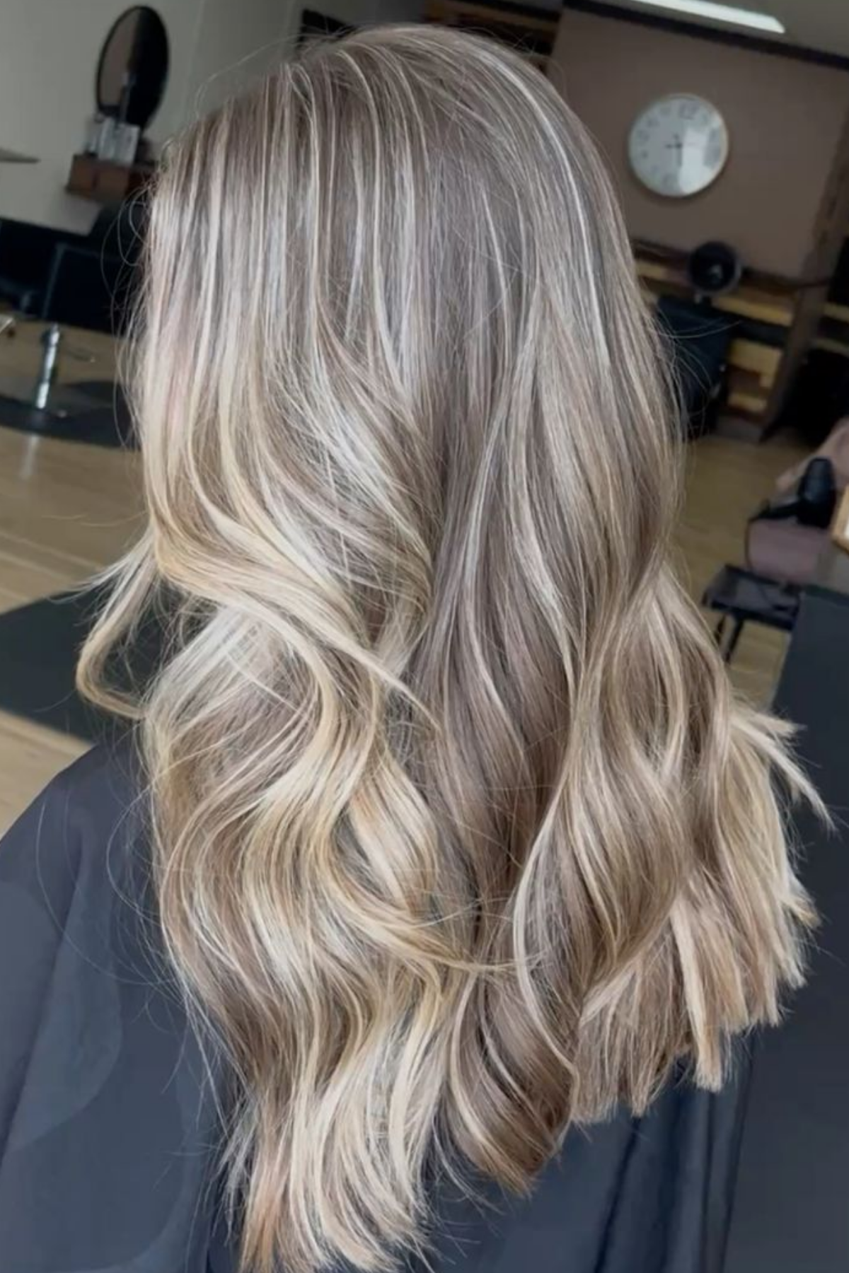 wide ribbon blonde highlights with dimensional movement in thick hair