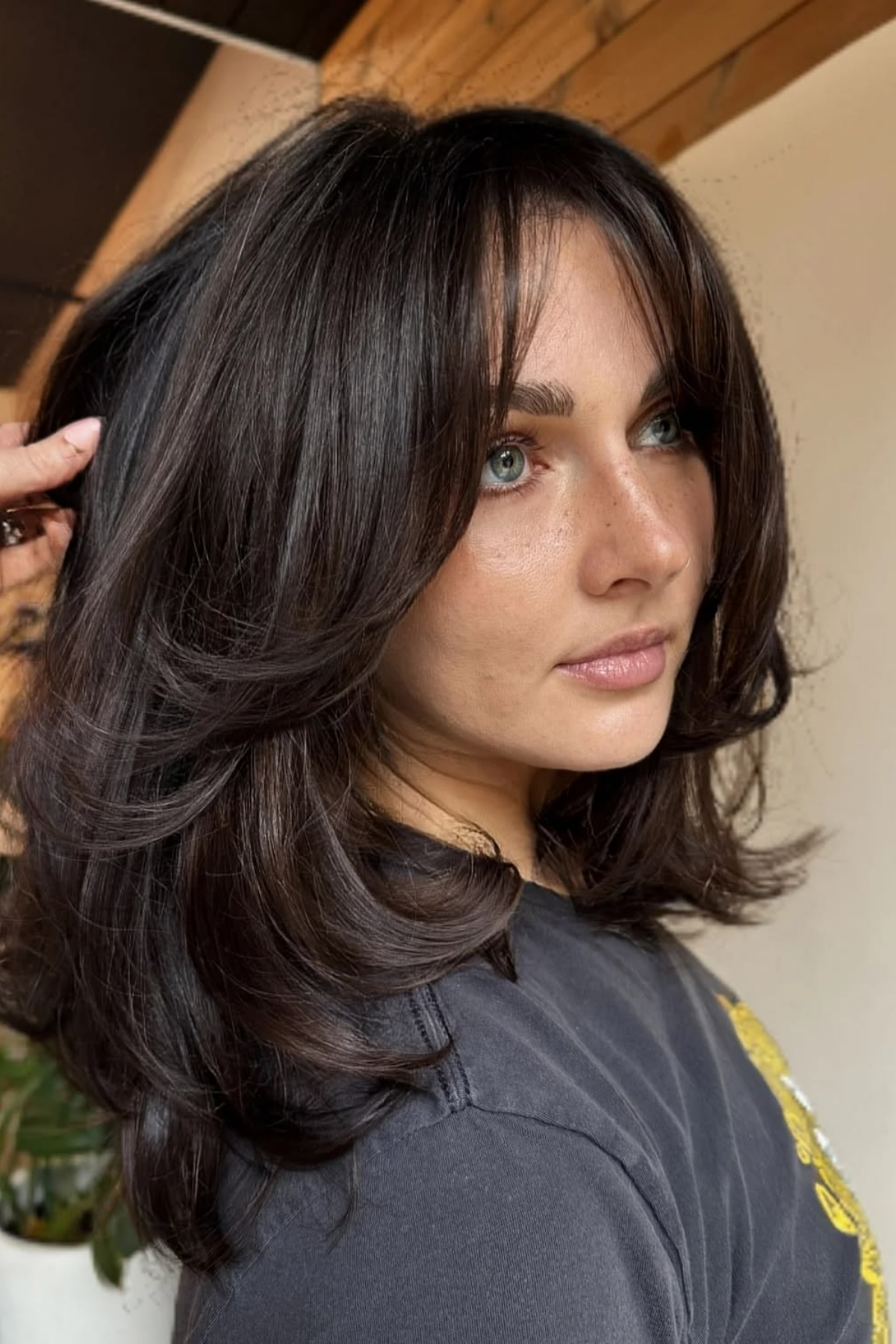 butterfly haircut on thick hair, feathered voluminous blowout