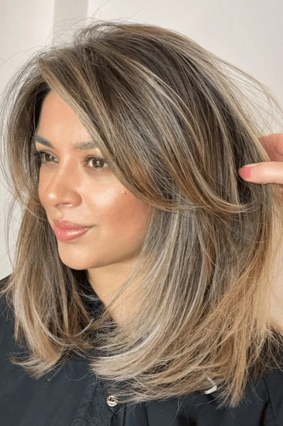 Long Layers with Side-Swept Bangs