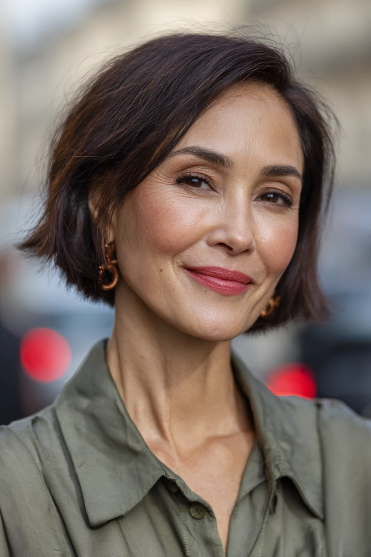 Italian bob at chin length on a woman in her sixties with dark brown hair
