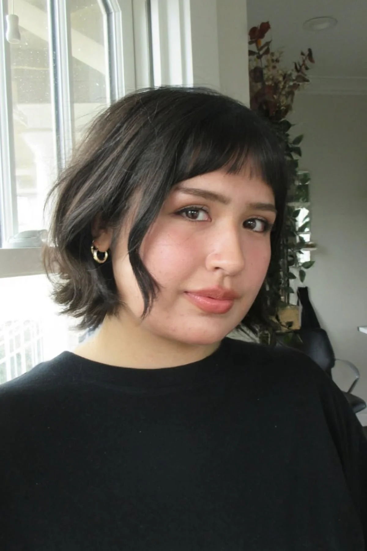 Woman wearing Feathered Shaggy Bob