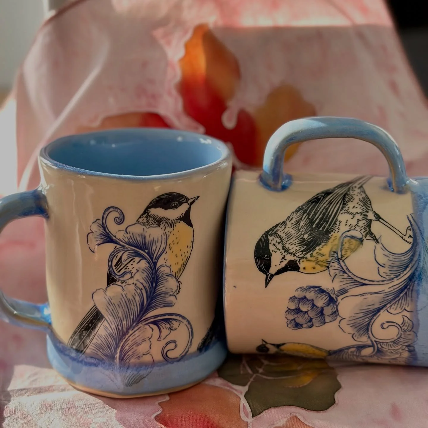 I love creating new designs within the same series. Staying true to the theme but yet a totally new look. This is what happened to the chickadees. 

A fresh light blue base glaze makes me longing to warmer days and frankly, there&rsquo;s so much dark