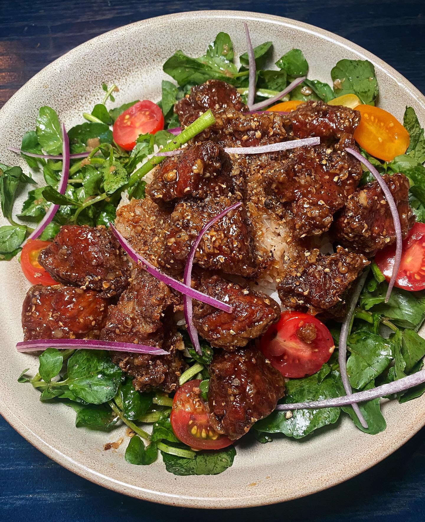 We like our beef shaken, not stirred. B&ograve; l&uacute;c lắc is a favorite classic served with watercress tomato salad.
.
.
.
.
#madamevobbq #dinner #lunch #foodandcuisines #eatingnewyork #nycft #eatupnyc #buzzfeast #sogood #tryitordiet #hypebeast 