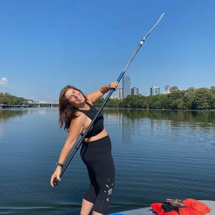 Dana Young paddling on Ladybird Lake in Austin Texas