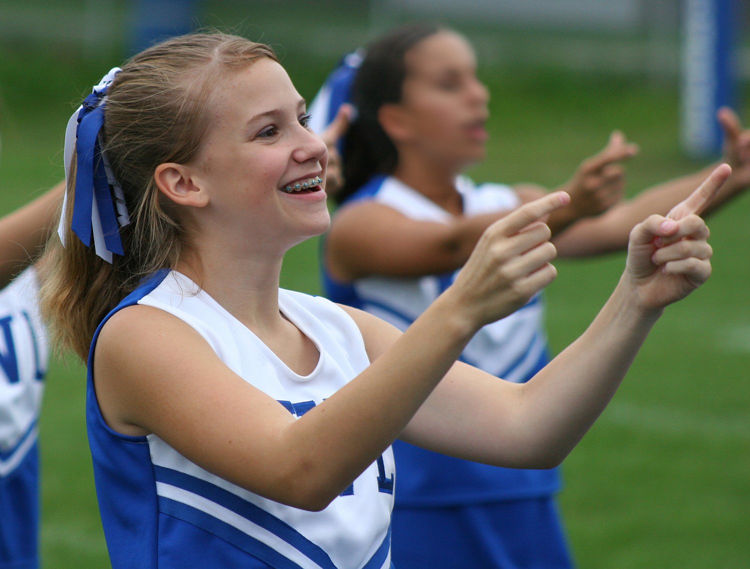 bigstock-Youth-Cheerleader-Cheering-At--1668392.jpg