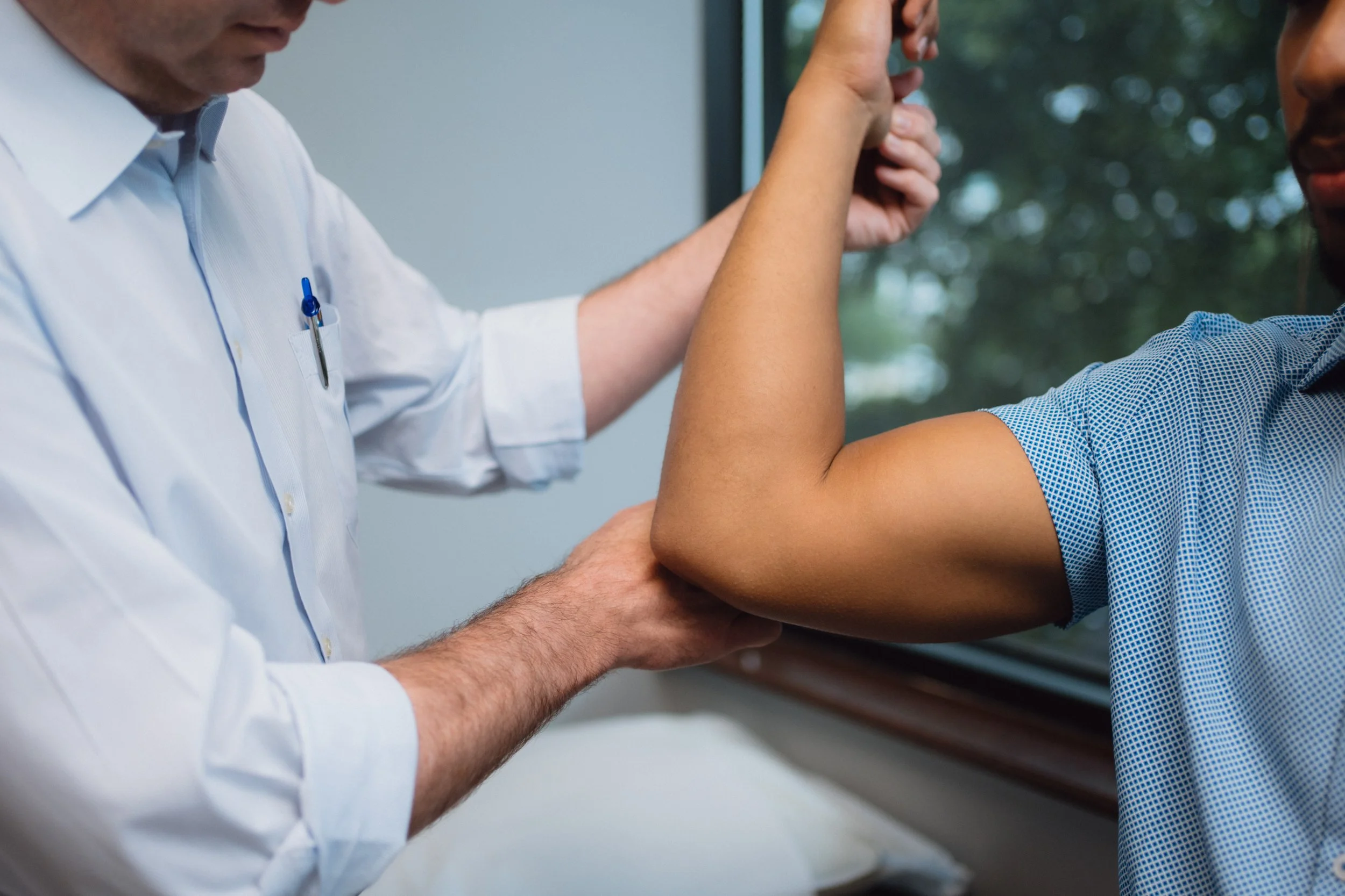 Baseball pitcher experiencing elbow pain related to UCL injury treated at Ortho San Antonio