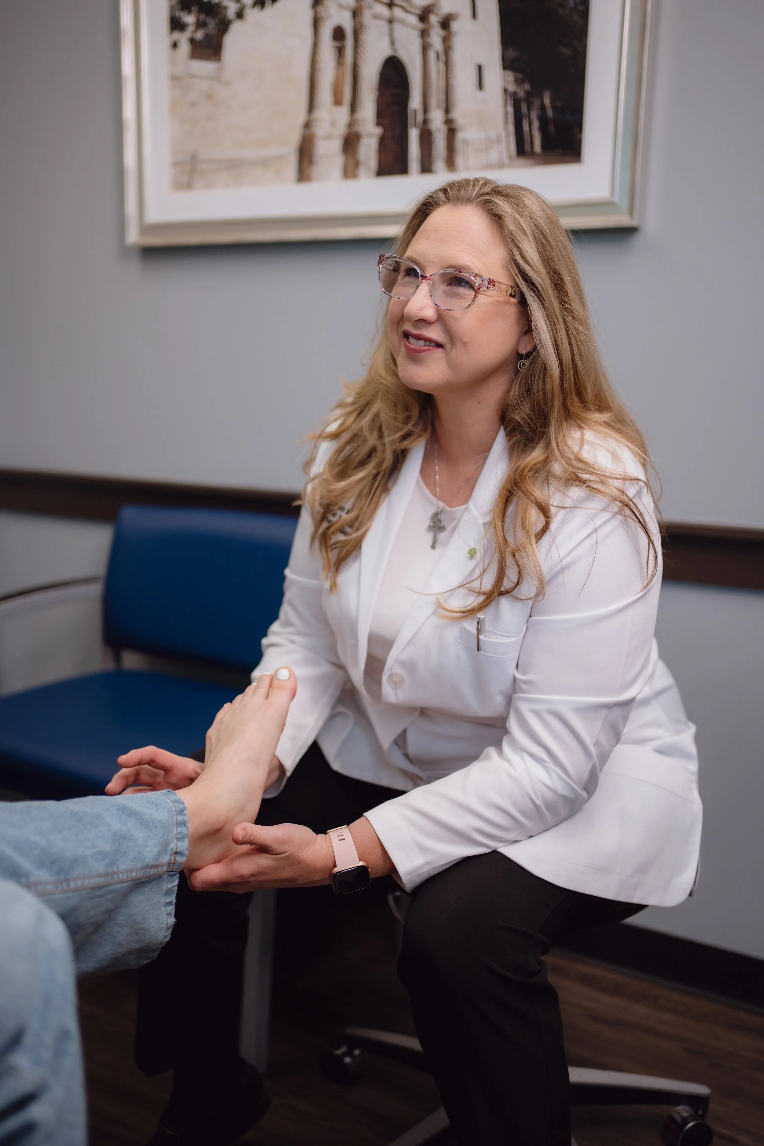 Orthopedic specialist McCarty evaluating ankle injury at Ortho San Antonio