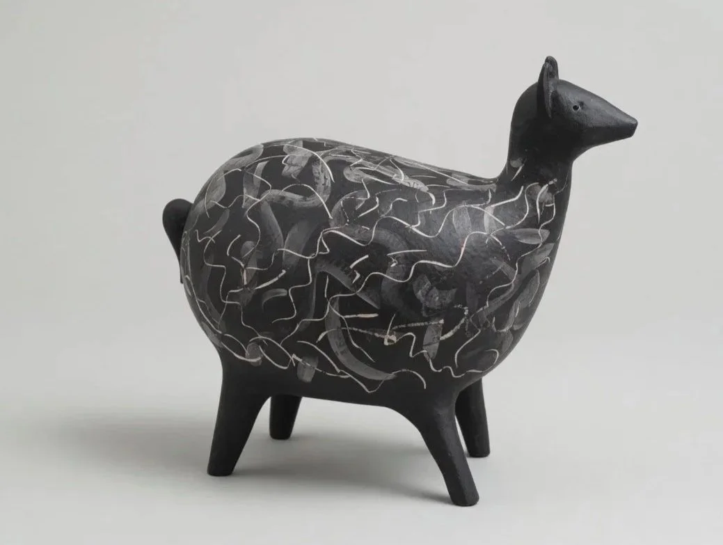 Oversized deer with loose, contemporary white sgraffito pattern.