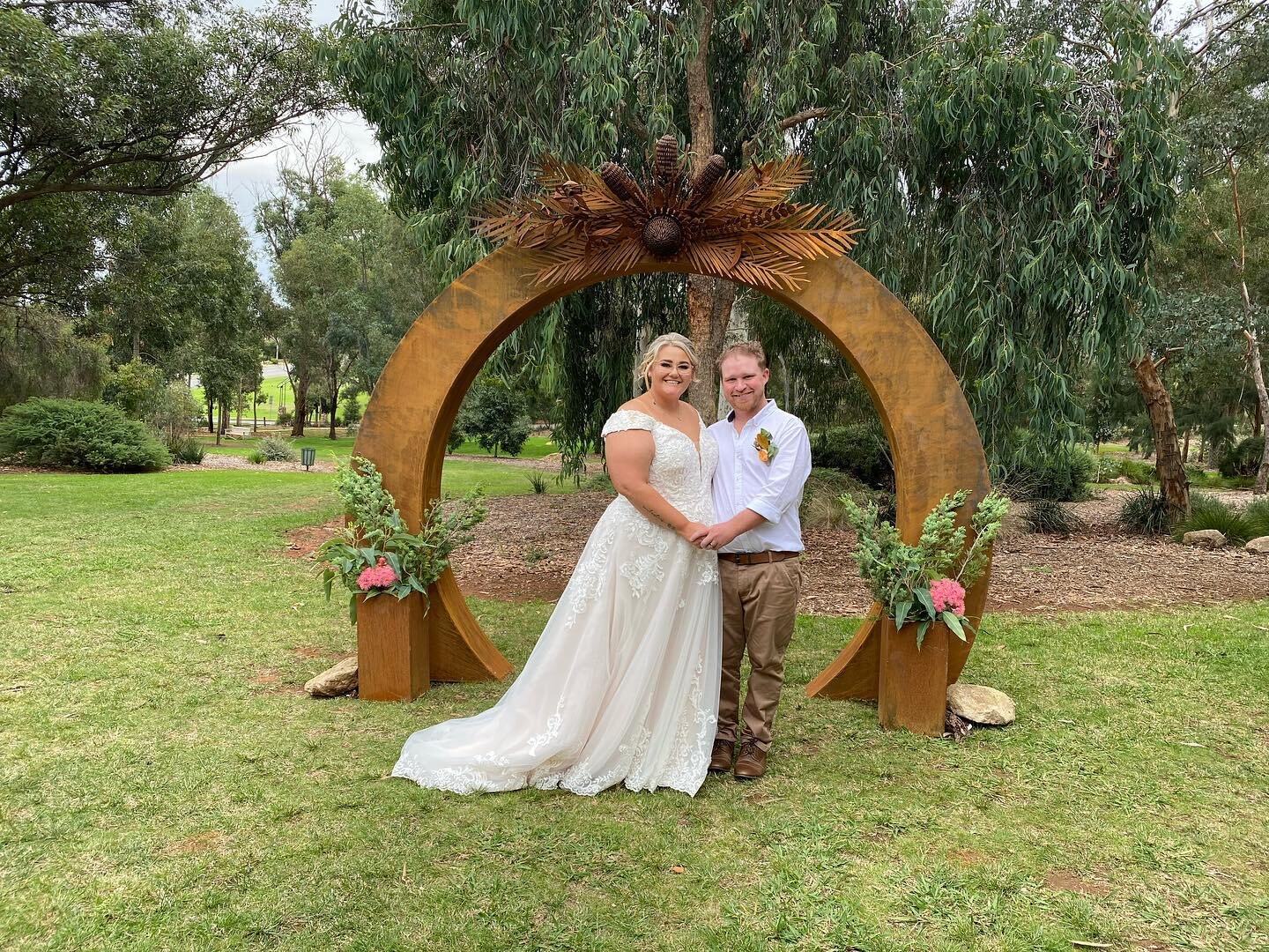 HAPPY, FUN and JOYFUL was the theme at CHLOE &amp; RHYS wedding. A huge Congratulations to this gorgeous couple. MR &amp; MRS GRIEVE. Such a special day 💖 I LOVED every minute How good does the arbour look 💐🥂🥳💕#janetschirmermarriagecelebrant #ce