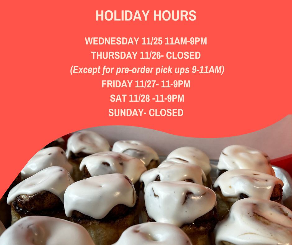 List of holiday hours over the days of the week with a background of cinnamon rolls topped with white icing.