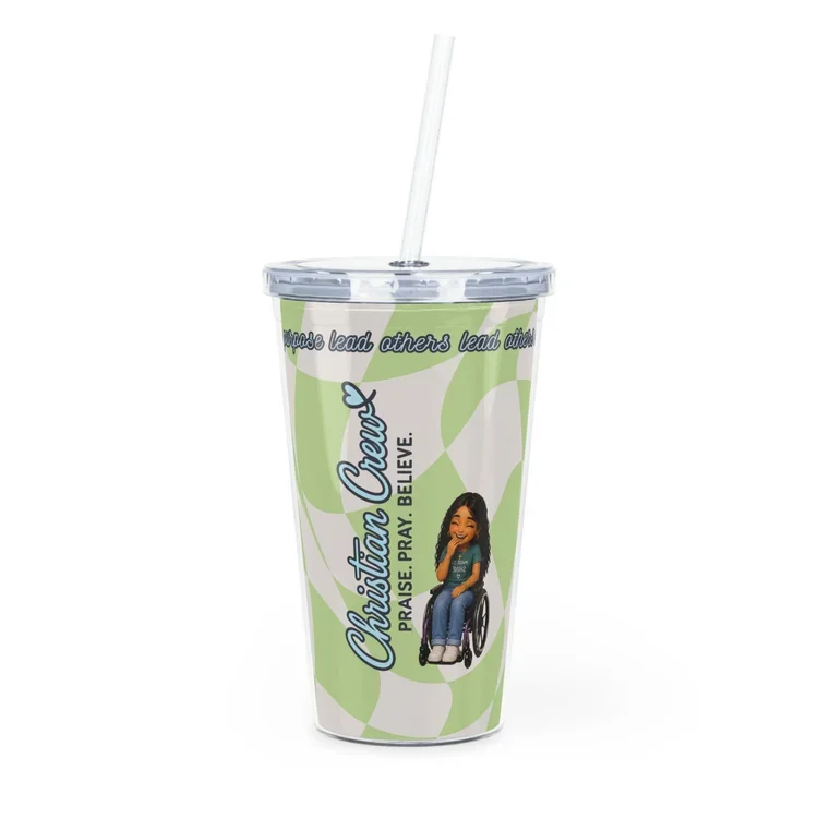 A clear plastic tumbler with a straw, featuring a cartoon girl in a wheelchair, with Christian-themed text and colors.