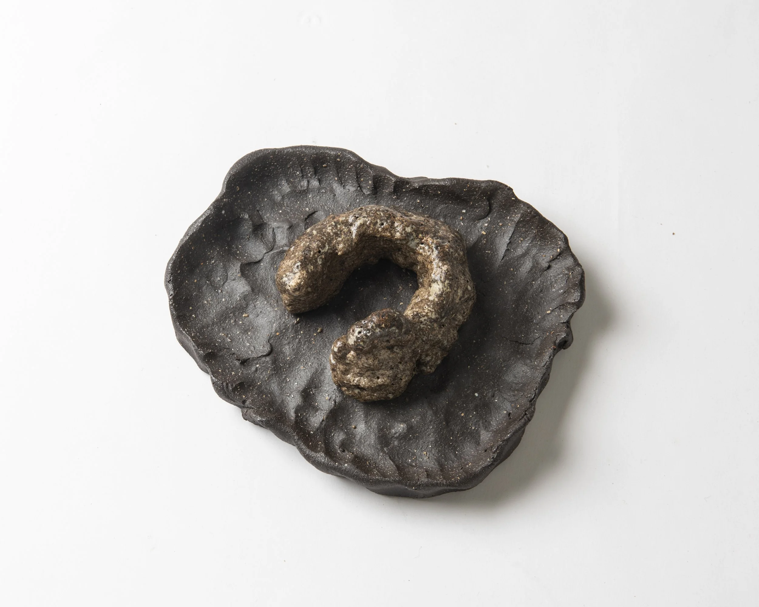 Portal remnants VI, 2025, stoneware ceramic: ball clay, bentonite trugel, ash, dark grogged commercial ceramic, 15 x 13 x 5cm. 