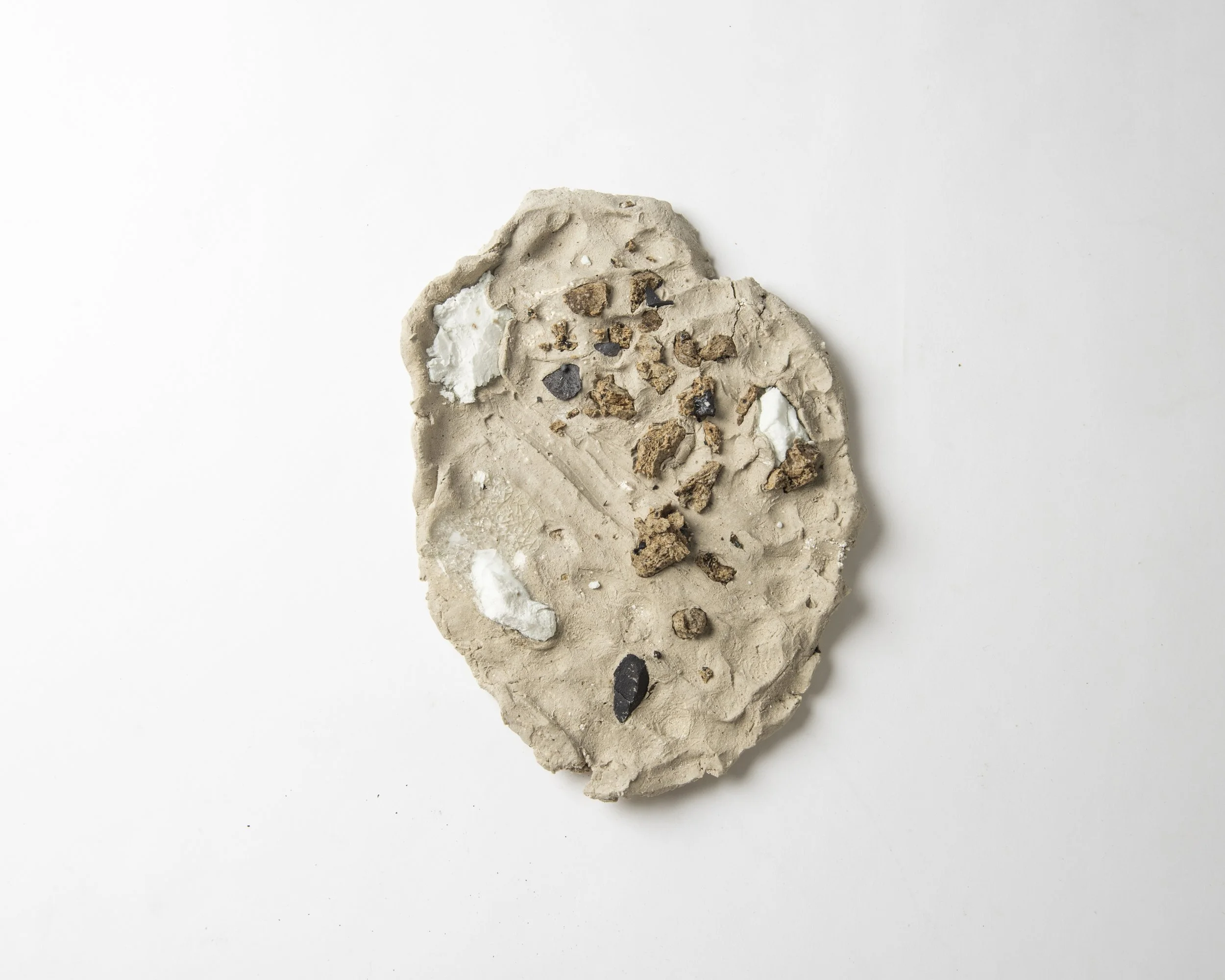 Portal remnants I, 2025, stoneware ceramics: ball clay, silica, ash, potash feldspar, eggshells, glass, 23 x 16.5 x 3cm. 