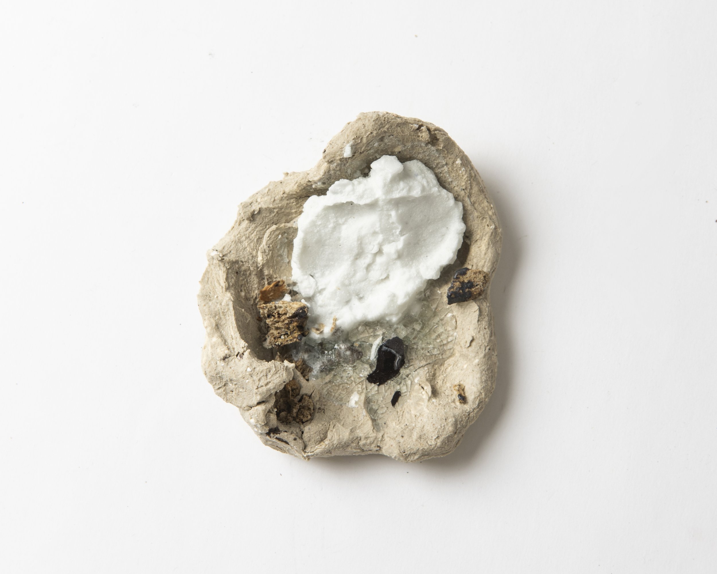 Portal remnants III, 2025, stoneware ceramics: ball clay, silica, ash, potash feldspar, eggshells, glass, 9.2 x 8.1 x 3.5cm. 