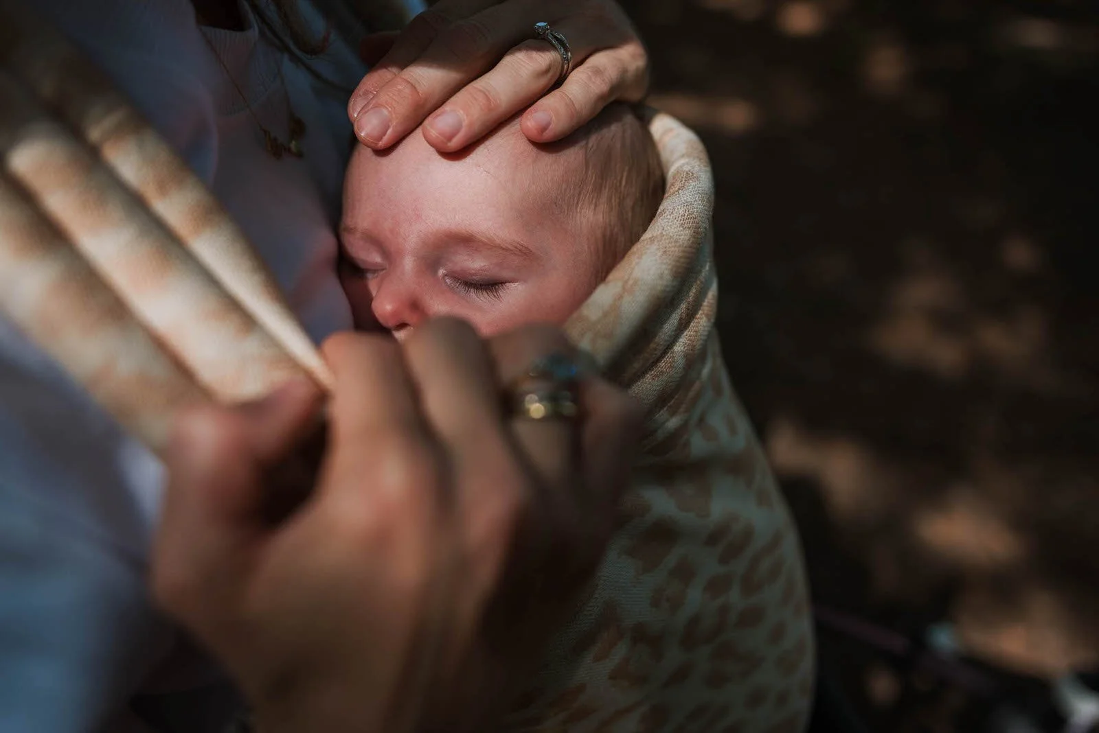 Mum cuddles her newborn during a brand photoshoot in Berkshire with Rebecca Thompson Photography