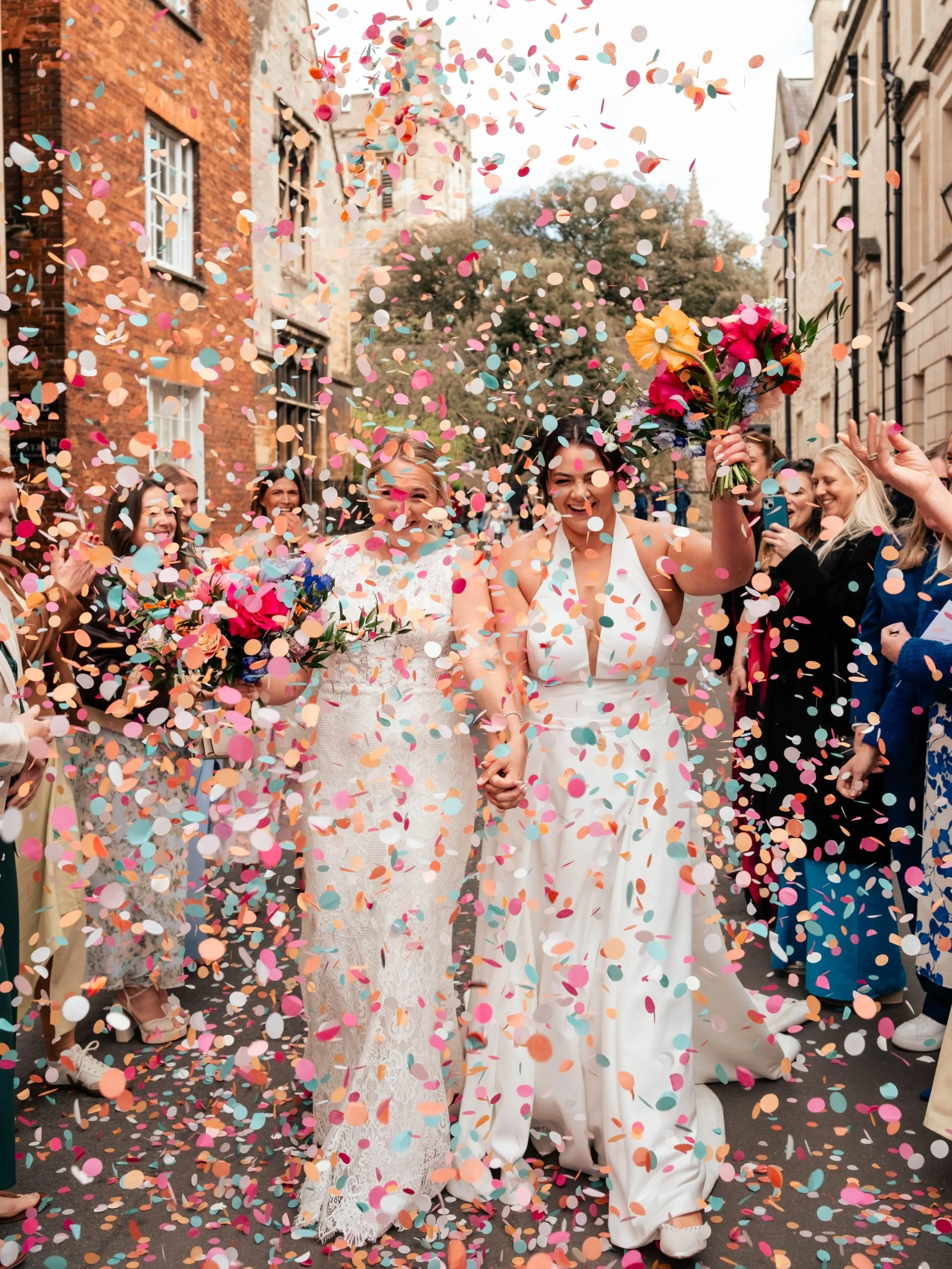 Emily &amp; Katy's explosive confetti run under the Bridge of Sighs in Oxford! You gotta love the chaos of the confetti shots and I'm excited to post more from this fantastic spring wedding. Sometimes confetti can end up where it's not supposed to be