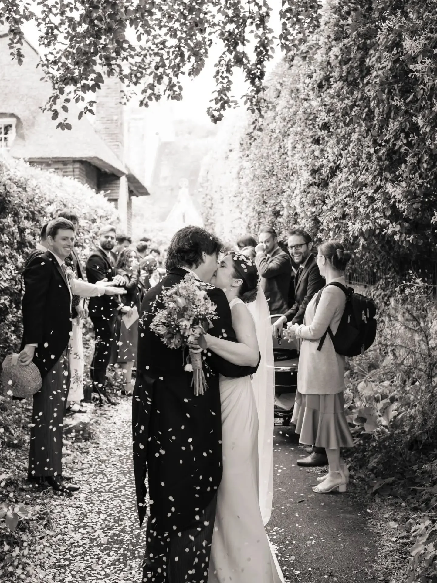 This was the last and final time I'd be telling the bride and groom to, "make sure you bring enough confetti" 🤣

I do love the way the church path was lined with confetti during the couple photos though!

This was back at the start of Summ