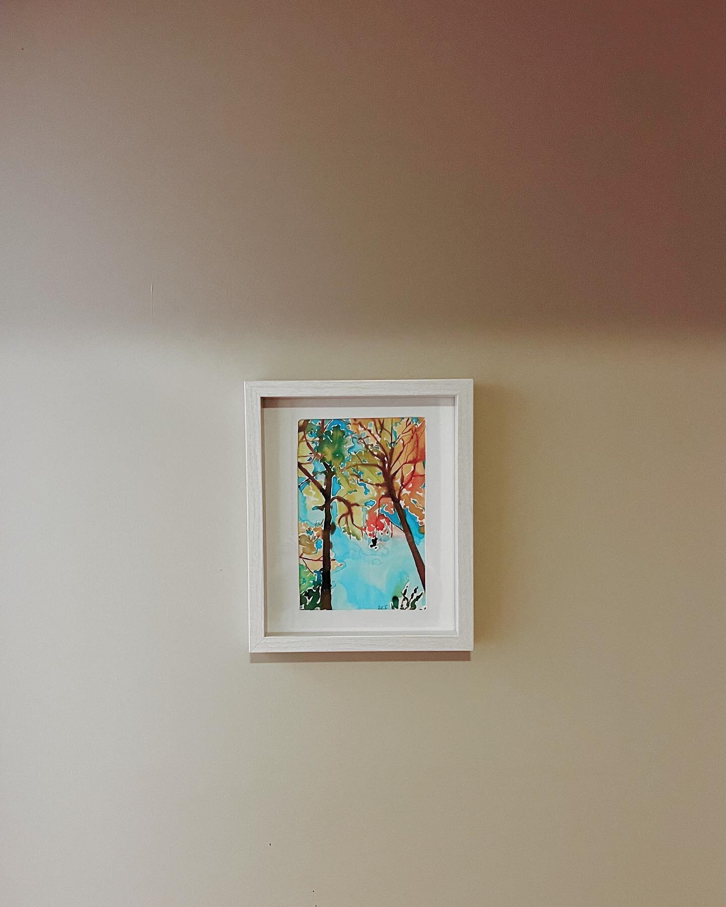 impromptu watercolor ~upscaled~ with a frame and a spot on the wall.