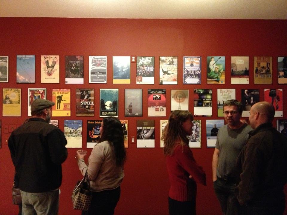 Folks perusing the wall of fame