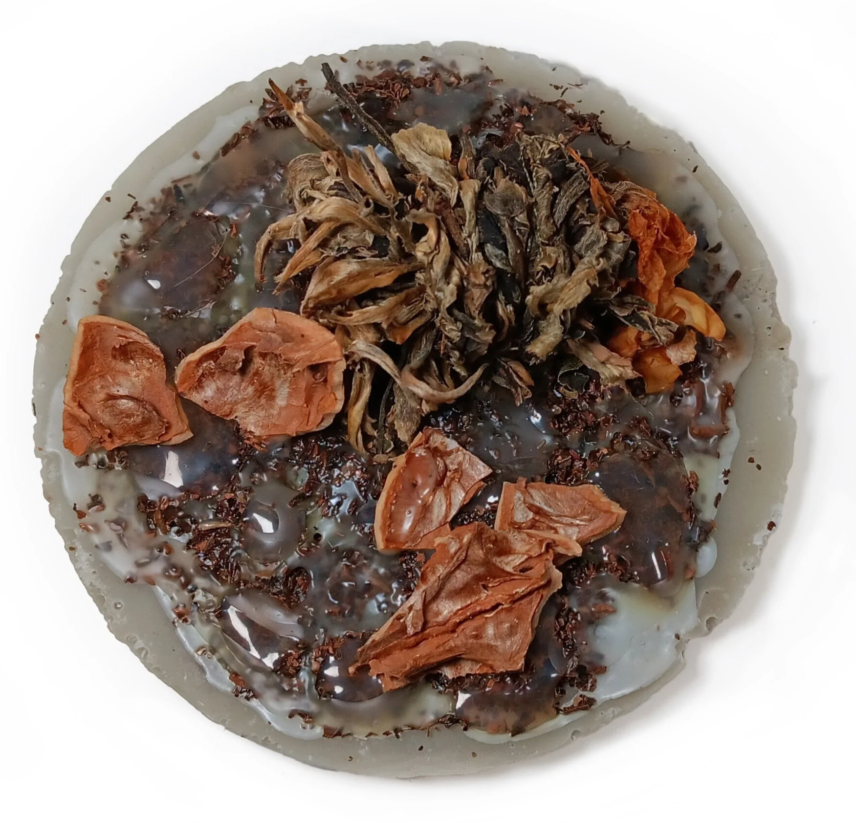 Round Jasmine adhesives _ 3inx2in _ jasmine tea flower, wood glue, school glue, reclaimed candle wax, walnut shell, dried tea _ 2024.jpg