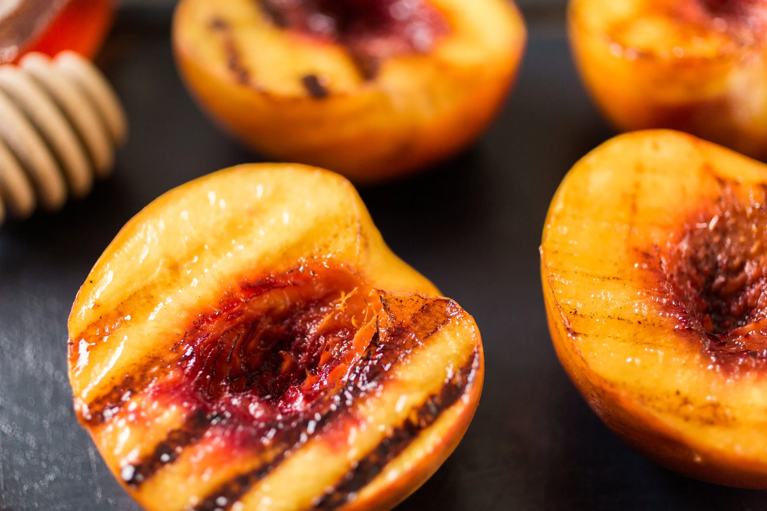 Grilled Peaches over Arugula w/ Goat Cheese & Prosciutto