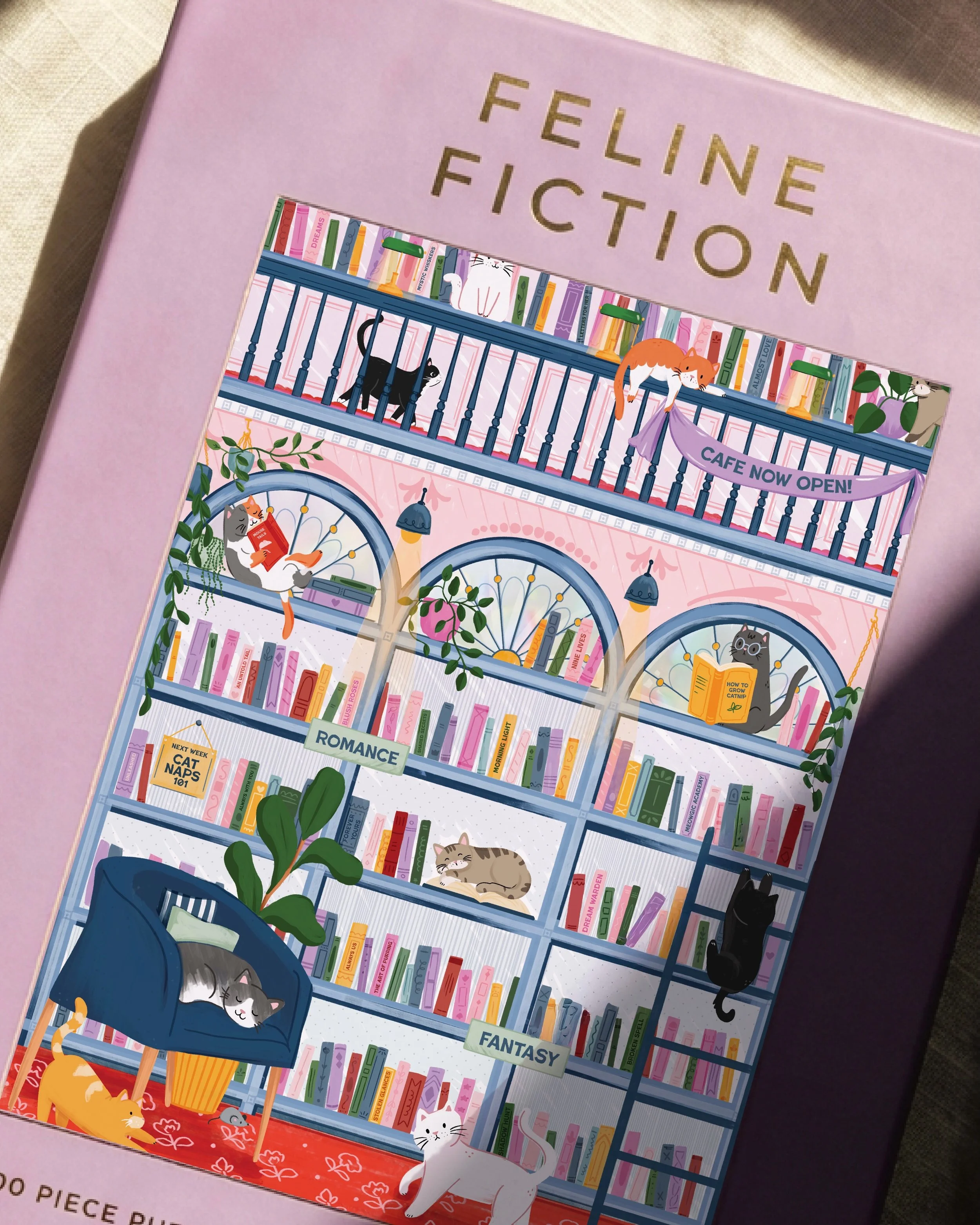 Feeline like we need to make more cat puzzles&hellip;

Feline Fiction was dreamed up by our in house design team and beautifully illustrated by @jenna.caswell.designs 

Jenna purr-fectly captured the vibe with this illustration. Who agrees? 👌👏👇