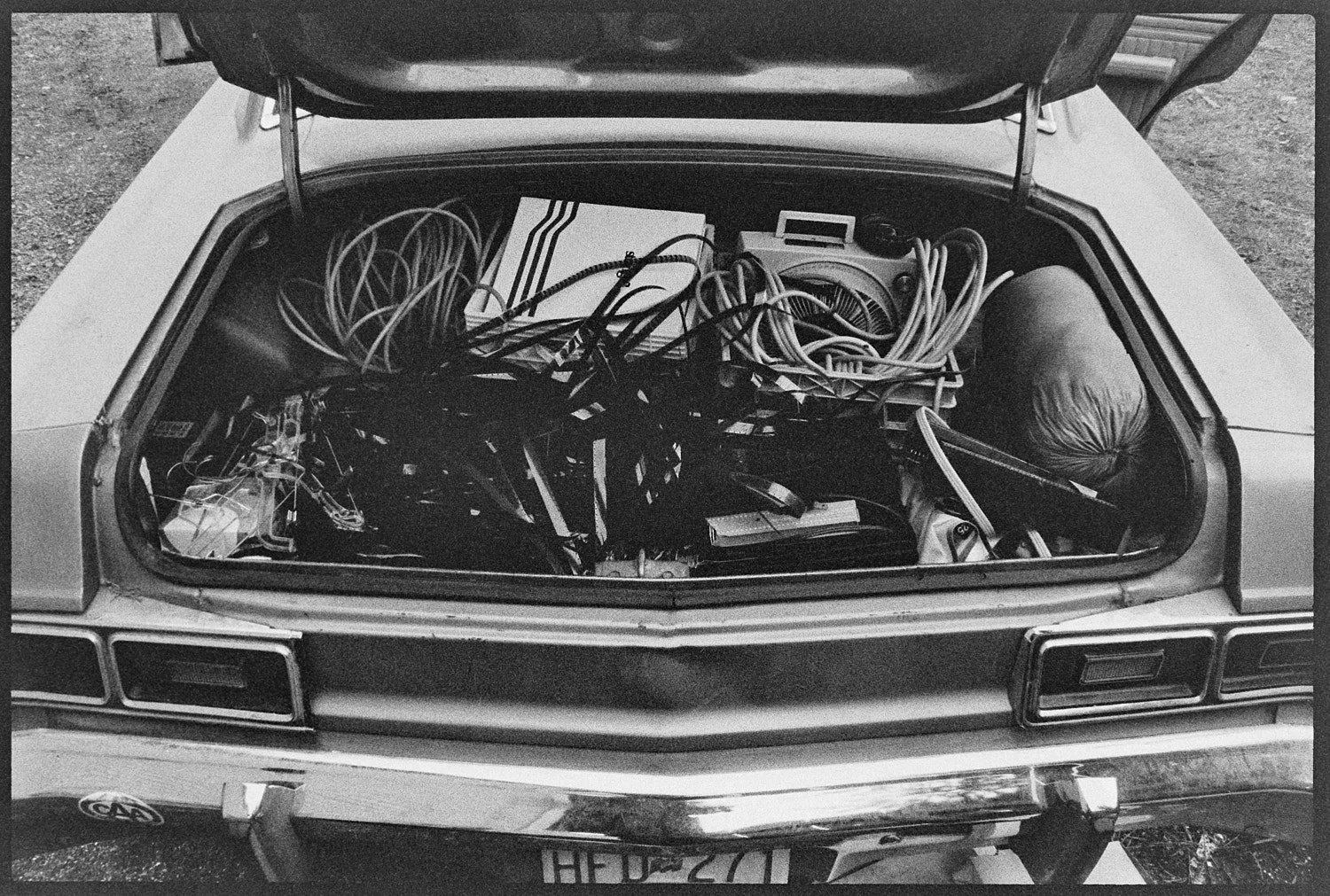 My '75 Dodge Dart filled with film loops, projectors and extension cords the morning after Never Never Land, 1996.  I didn't headline this event.  From what I remember I curated a chill-out room.  This allowed me to come and go to photograph the main