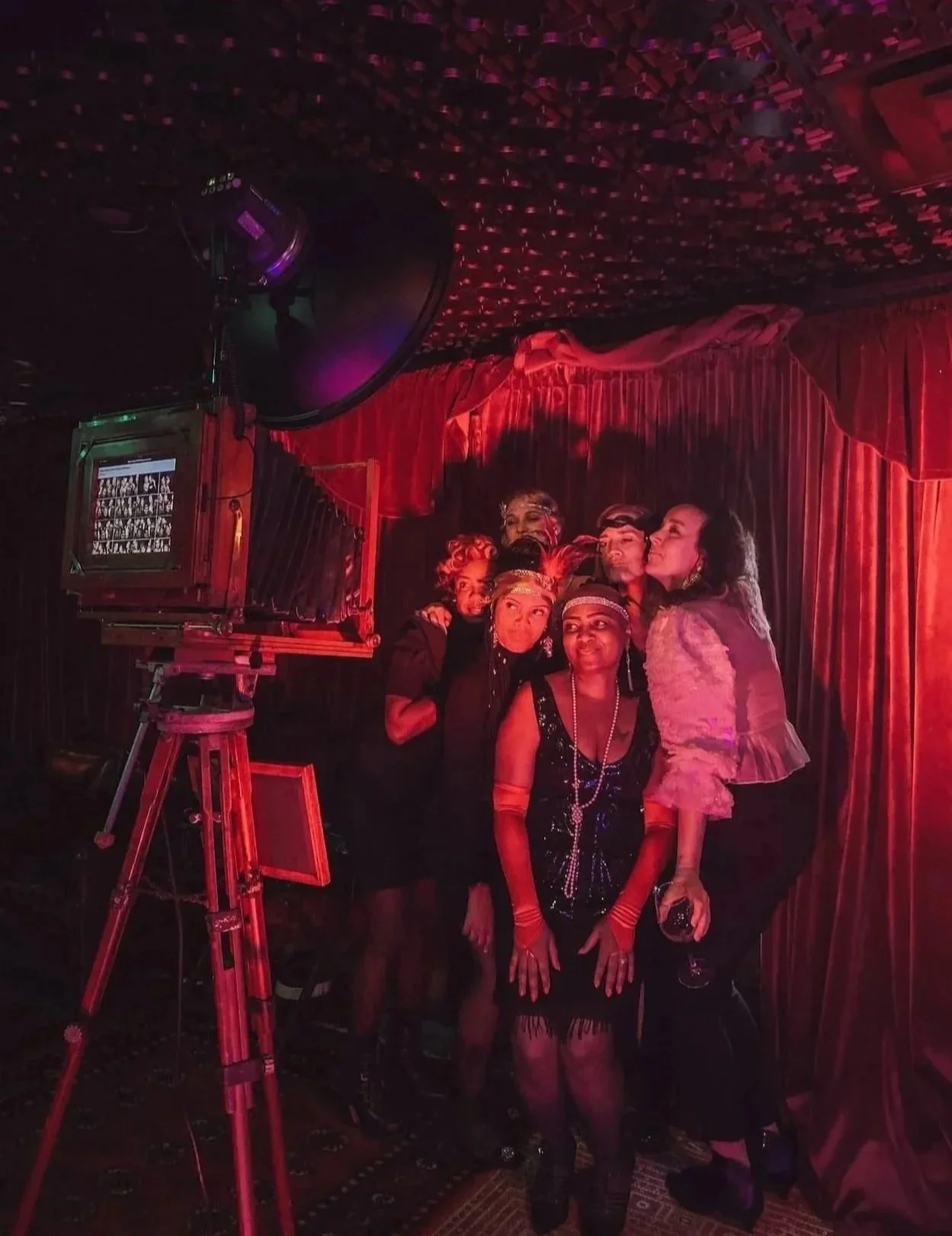 Group of people enjoying Chicago's best photo booth.