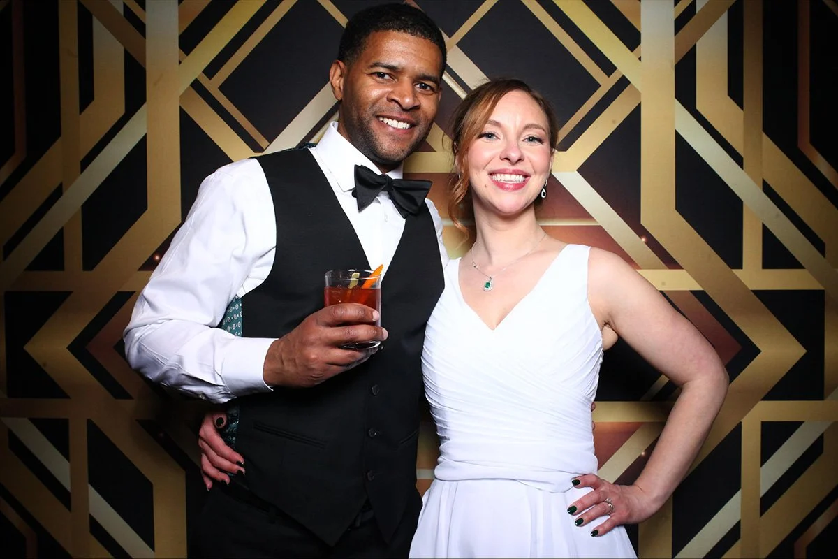 Wedding couple posing at their Great Gatby-themed wedding at LM Studio Chicago.
