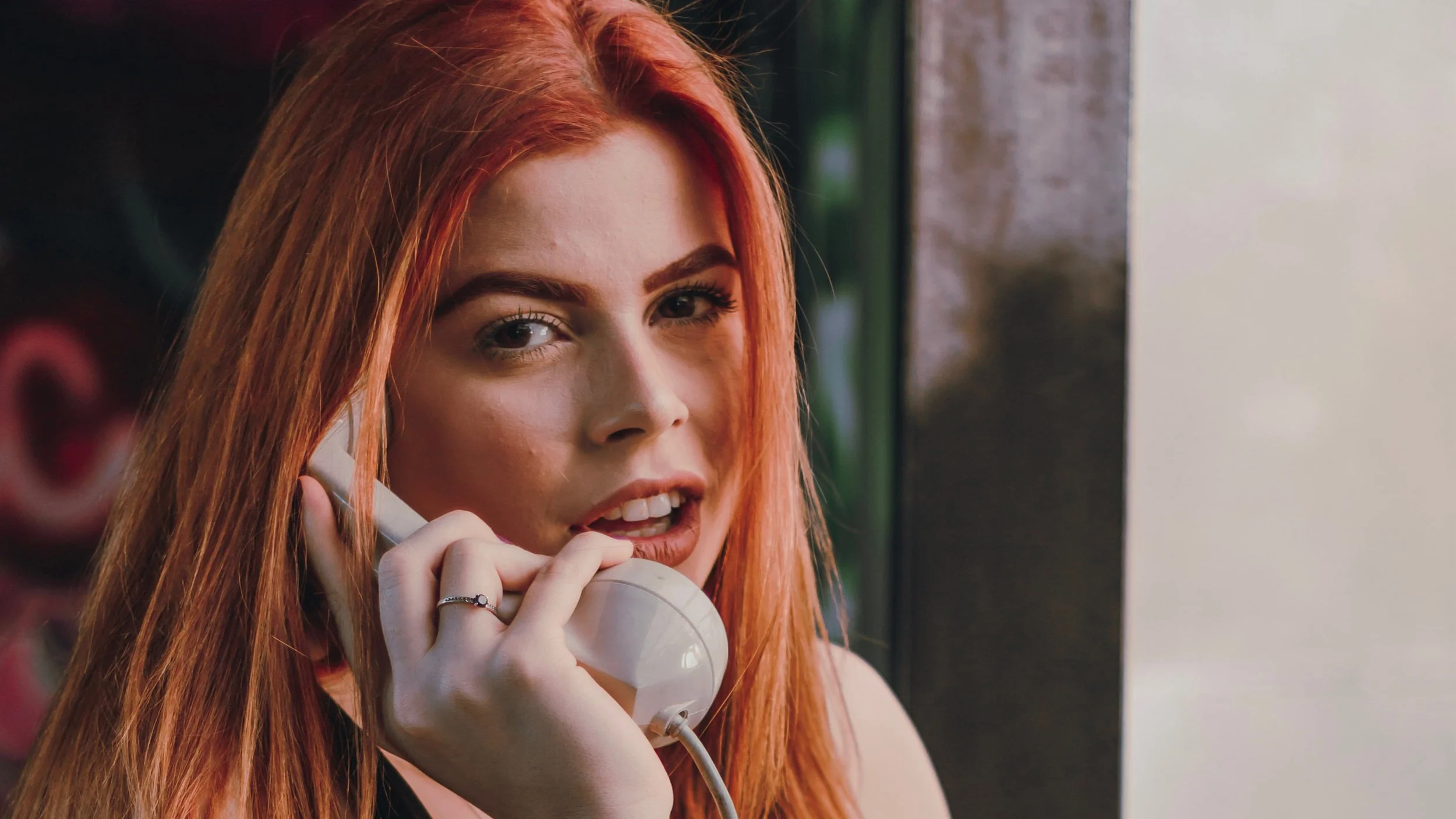 girl using audio guestbook phone
