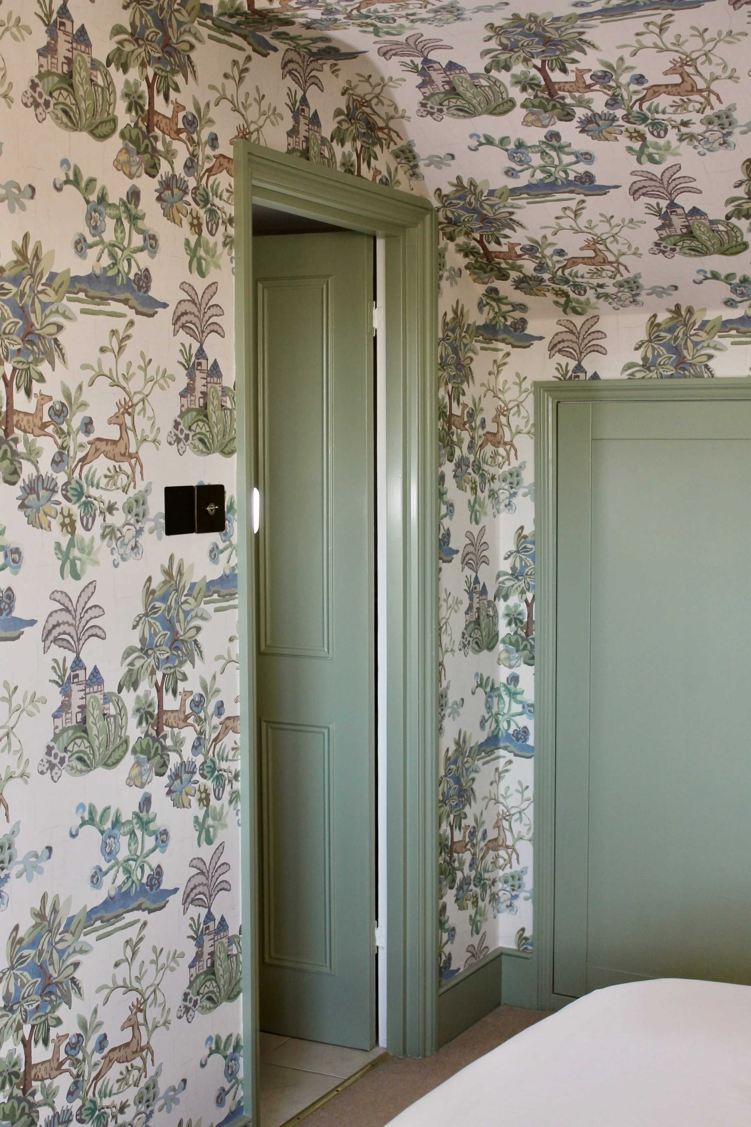 Woodwork painted a coordinating green with  Edward Bulmer's plant-based paint