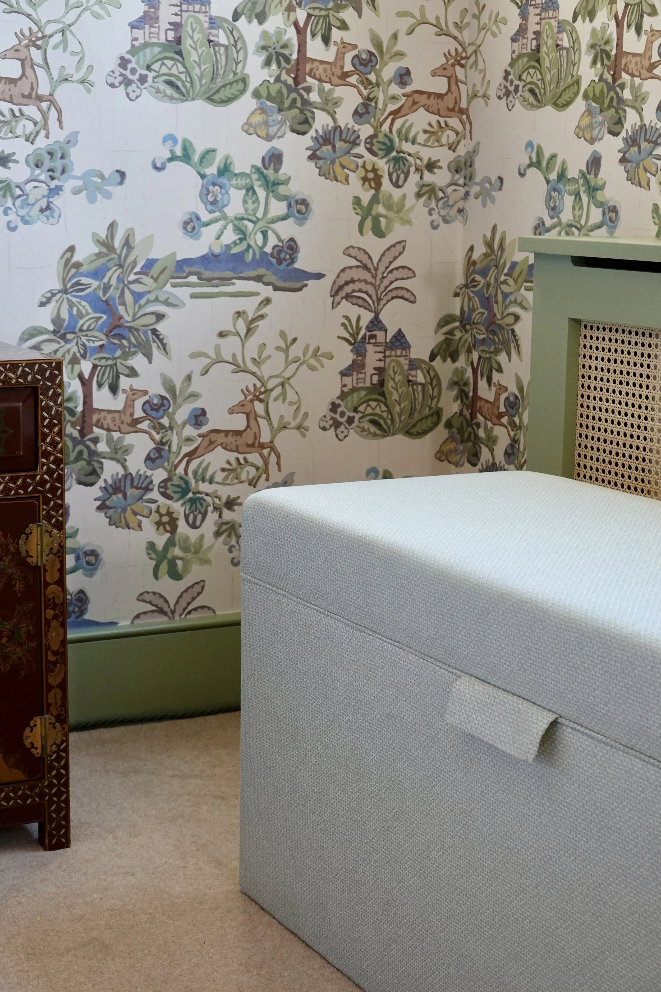 Bespoke ottoman with custom cane radiator behind