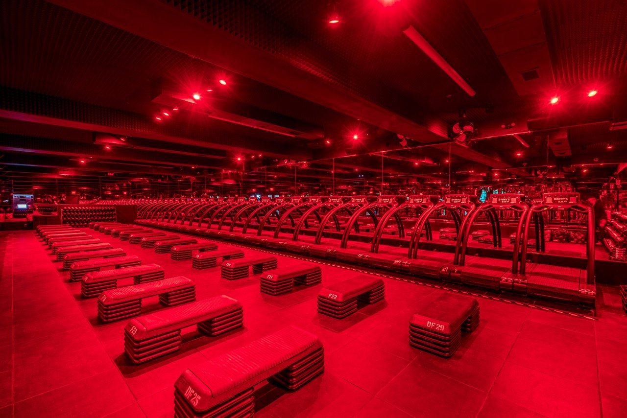 Barry's Bootcamp features fully immersive, lighting-adaptive fitness studios meant to optimize workout performance. Genius!