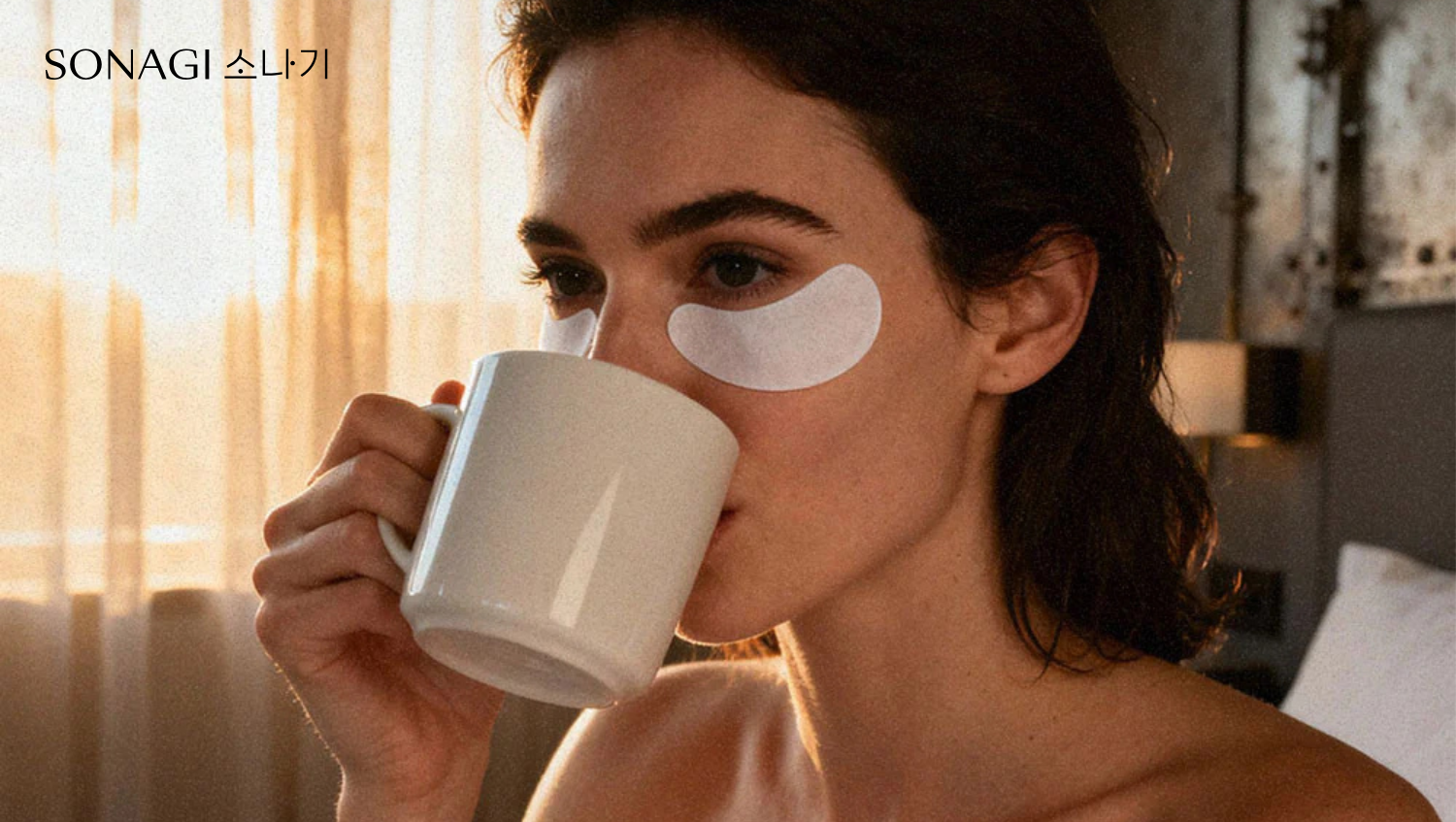 Image of woman with eye patches on face