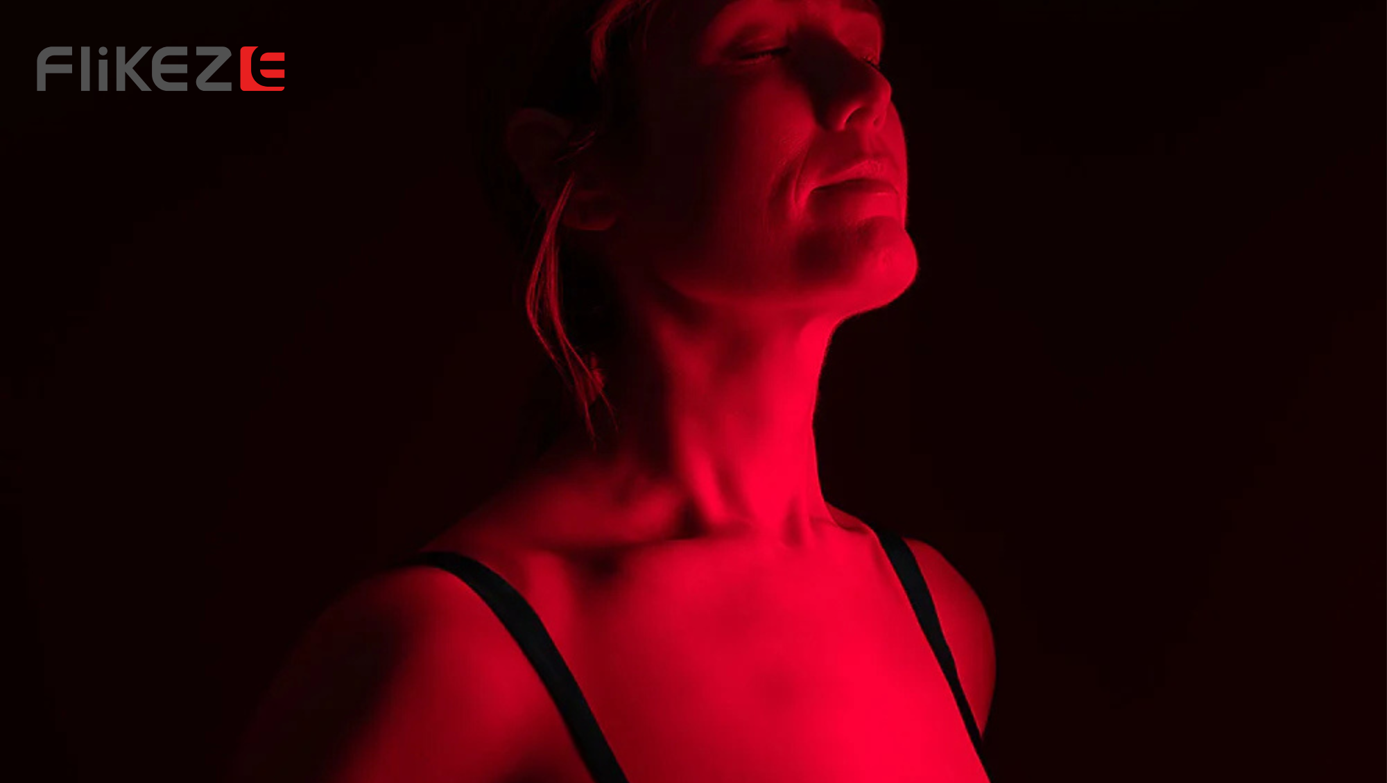 IMAGE OF WOMAN USING RED LIGHT 