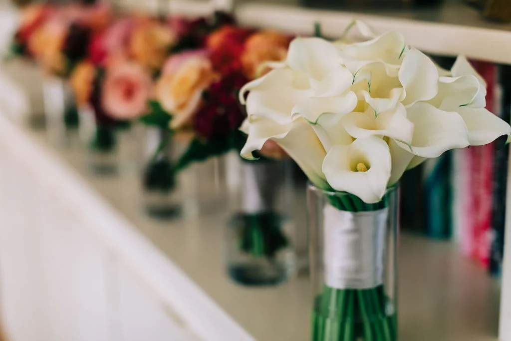 San Diego Wedding Photographer, Christel Tran, capturing the bouquets for the bride and bridesmaids