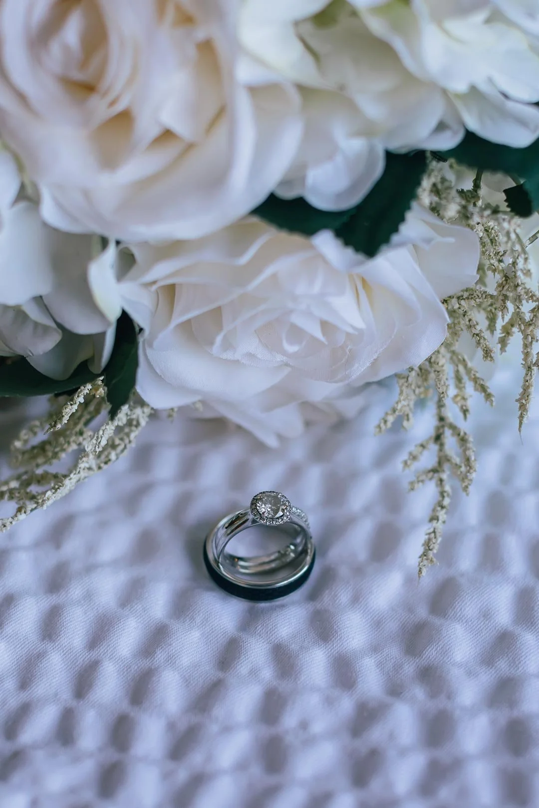 Bridge and groom rings photographed by San Diego Wedding Photographer, Christel Tran