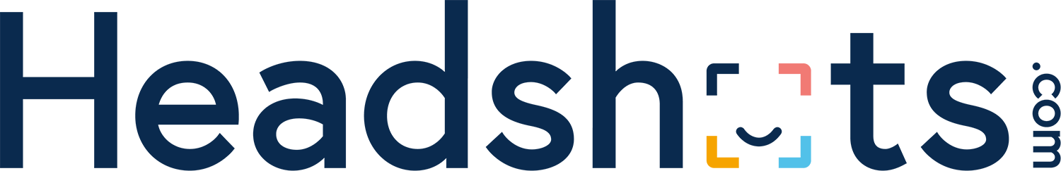 Logo with the word "Headshots.com" in large blue letters and a camera icon with a red square, yellow square, blue square, and teal square in a square formation.
